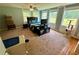 Spacious bedroom with ample natural light from the multiple windows at 23 Jennifer Ln, Rydal, GA 30171