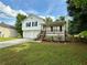 Charming two-story home featuring a front porch, two-car garage, and neat landscaping at 23 Jennifer Ln, Rydal, GA 30171