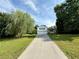 Charming two-story home featuring a front porch, two-car garage, and a long driveway at 23 Jennifer Ln, Rydal, GA 30171