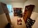 Home office features a built-in desk, shelving, and neutral carpet at 23 Jennifer Ln, Rydal, GA 30171