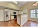 Bright kitchen with stainless steel appliances and granite countertops at 3865 Portico Run Dr, Buford, GA 30519