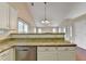Eat-in kitchen featuring granite counters, stainless appliances, and bright natural light at 3865 Portico Run Dr, Buford, GA 30519