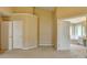 Spacious main bedroom with neutral walls and carpet, featuring plenty of closet space and natural light at 3865 Portico Run Dr, Buford, GA 30519