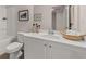 Bright bathroom featuring a white vanity with a single sink and decor at 50 Leggett Dr # 184, Villa Rica, GA 30180