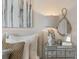 Bedroom decor features a lamp, artwork and mirror at 50 Leggett Dr # 184, Villa Rica, GA 30180