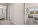 Hallway view with a bathroom and bedroom, providing easy access from room to room at 50 Leggett Dr # 184, Villa Rica, GA 30180