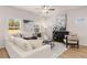 Comfortable living area featuring a plush white sectional, stylish furnishings, and contemporary design at 50 Leggett Dr # 184, Villa Rica, GA 30180