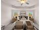 Serene main bedroom with tray ceilings, natural light, and stylish furnishings for relaxation at 50 Leggett Dr # 184, Villa Rica, GA 30180