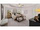Serene main bedroom boasting a tray ceiling, large windows, and a comfortable seating area at 50 Leggett Dr # 184, Villa Rica, GA 30180