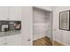 Spacious pantry with ample shelving, offering convenient storage space within the kitchen area at 50 Leggett Dr # 184, Villa Rica, GA 30180