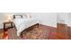 Bright bedroom with hardwood flooring, queen-sized bed, and ample closet space at 52 Chaumont Nw Sq, Atlanta, GA 30327