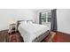 Comfortable bedroom with queen bed, side tables and window at 52 Chaumont Nw Sq, Atlanta, GA 30327