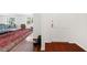 Bright living room with a couch and a red rug at 52 Chaumont Nw Sq, Atlanta, GA 30327