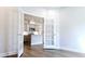 This office space includes attractive French doors leading to the kitchen area at 621 Pineberry Ct, Grayson, GA 30017