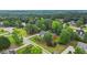 Beautiful aerial view of the home nestled among mature trees in a desirable neighborhood at 1253 Oakwood Pl, Loganville, GA 30052