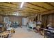 Unfinished basement area with exposed insulation, ready for customization and ample storage space at 1253 Oakwood Pl, Loganville, GA 30052