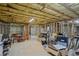 Unfinished basement with exposed ceiling and storage at 1253 Oakwood Pl, Loganville, GA 30052