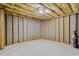 Unfinished basement space offering potential for customization and additional living area at 1253 Oakwood Pl, Loganville, GA 30052