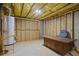 Spacious unfinished basement area with water heater and plenty of room to create your dream space at 1253 Oakwood Pl, Loganville, GA 30052
