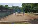 Community playground featuring a swing set and climbing structure, perfect for families and children to enjoy at 13030 Crabapple Lake Dr, Roswell, GA 30076