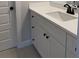 Modern bathroom with a white vanity, a black faucet, and neutral flooring at 2021 Shallowford Rd, Marietta, GA 30066