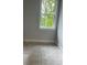 Small bedroom with a large window that provides a lot of natural light at 2021 Shallowford Rd, Marietta, GA 30066