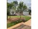 Beautiful two-story home featuring a brick and white exterior and a spacious two car garage at 2021 Shallowford Rd, Marietta, GA 30066