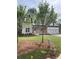 Beautiful two-story home featuring a brick and white exterior and a spacious two car garage at 2021 Shallowford Rd, Marietta, GA 30066