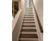 View of the staircase under construction with wooden steps at 2021 Shallowford Rd, Marietta, GA 30066