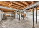 Unfinished basement with exposed ceiling, concrete floor, and mechanical systems at 519 Beaver Ruin Nw Way, Lilburn, GA 30047