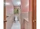 Cozy bathroom with a tile surround, perfect for a quick refresh at 519 Beaver Ruin Nw Way, Lilburn, GA 30047
