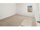 Bedroom with neutral carpet, a window, and bright natural light at 1483 Autumn Wind Dr, Dacula, GA 30019