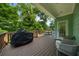 Inviting outdoor deck with comfortable seating and lush greenery at 2324 Oakview Ne Rd, Atlanta, GA 30317