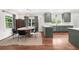 Open eat-in kitchen with stainless steel appliances, granite countertop, and new cabinets at 2324 Oakview Ne Rd, Atlanta, GA 30317