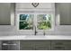 Modern kitchen with granite countertops, stainless steel appliances, and stylish fixtures at 2324 Oakview Ne Rd, Atlanta, GA 30317
