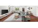 Bright living room with hardwood floors, modern furniture, and large windows for ample natural light at 2324 Oakview Ne Rd, Atlanta, GA 30317