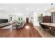 Bright and airy living room featuring hardwood floors and a cozy seating area with large windows at 2324 Oakview Ne Rd, Atlanta, GA 30317