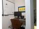 Home office nook featuring a computer setup, motivational art, and neutral decor at 5419 S Lake Dr, Douglasville, GA 30135
