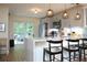 Beautiful kitchen with modern appliances, hanging lights, and marble countertop at 5419 S Lake Dr, Douglasville, GA 30135