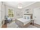 Serene bedroom with natural light, comfortable furnishings, and neutral décor at 6815 Berkley Rd, Cumming, GA 30040