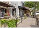 Charming street view of dining and retail establishments with sidewalk seating at 6815 Berkley Rd, Cumming, GA 30040