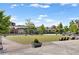 Inviting town square featuring a manicured lawn, patio seating, and string lights for a relaxed atmosphere at 6815 Berkley Rd, Cumming, GA 30040