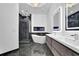 Luxurious bathroom features a soaking tub, glass shower, and modern fixtures at 2207 Concordia Se Way # 12, Mableton, GA 30126