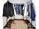 Functional closet with rack-mounted shelving for efficient clothing storage and easy organization at 2207 Concordia Se Way # 12, Mableton, GA 30126