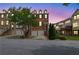 Elegant brick townhomes feature attached garages and well-maintained landscaping at 2207 Concordia Se Way # 12, Mableton, GA 30126