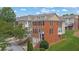 Charming brick townhomes boast manicured landscaping and convenient attached garages at 2207 Concordia Se Way # 12, Mableton, GA 30126