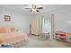 Bright bedroom featuring neutral carpet, a window, and classic furnishings and decor at 2808 Vinings Central Se Dr # 158, Atlanta, GA 30339