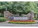 Attractive stone monument sign with landscaping for Vinings Central Condominiums sets a welcoming tone at 2808 Vinings Central Se Dr # 158, Atlanta, GA 30339