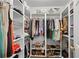 Spacious walk-in closet with custom shelving and ample storage for shoes and hanging clothes at 2808 Vinings Central Se Dr # 158, Atlanta, GA 30339