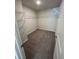 Empty walk-in closet with wire shelving, ready to be organized and customized for ample storage at 4263 Notting Hill Sw Dr, Atlanta, GA 30331